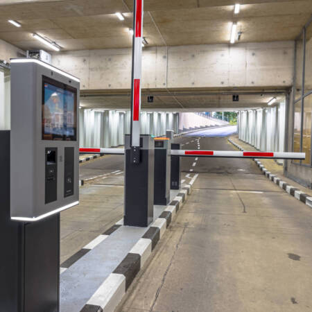 Barrier at Entrance and Exit of a car Parking garage. Fully automated barrier from car park. Underground parking, garage. Interior of parking